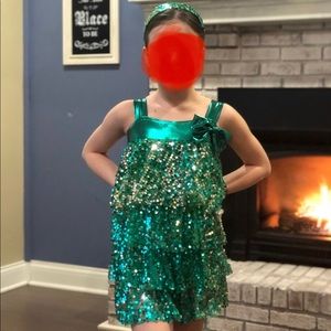 Green sequined costume